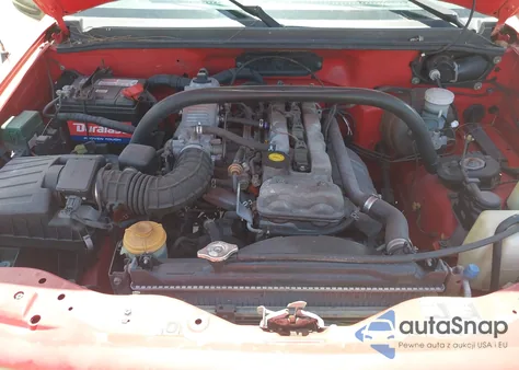 2002 Chevrolet Tracker из США, поврежденный, VIN 2CNBE18C926911755